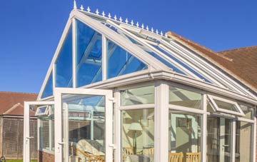 conservatory roof insulation costs Bustards Green